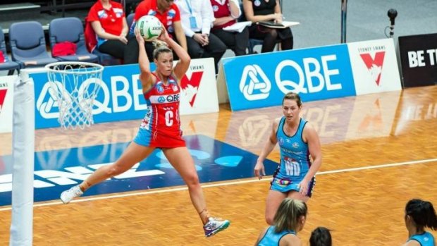 Taking flight: Kim Green gets airborn as the NSW Swifts defeat the Southern Steel in Canberra on Friday.