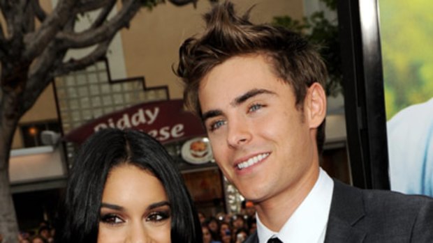Single again ... reports that Zac Efron and Vanessa Hudgens have split.