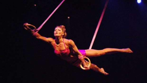 A performer defies gravity in Cirque du Soleil’s Totem.