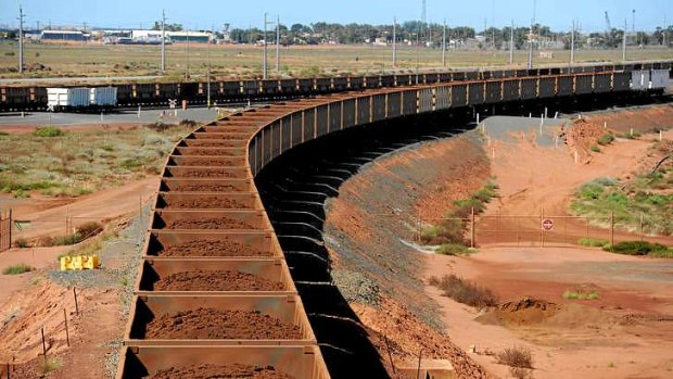 A Fortescue Metals Group  train loaded with iron ore from the Cloudbreak operation arrives at Port Hedland.