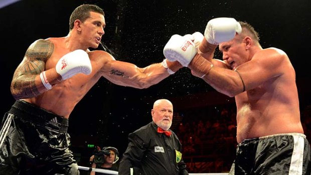 No slouch ... Sonny Bill Williams takes on Scott Lewis.