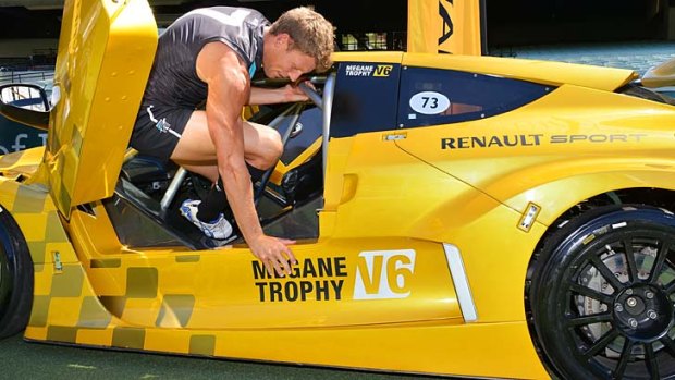 Slow exit: Brad Ebert struggles to extricate himself from the Renault racer.