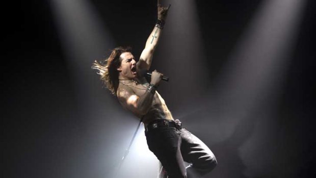 Rocking... Tom Cruise channels Stacee Jaxx while filming the musical <i>Rock of Ages</i>. Photo: tomcruise.com