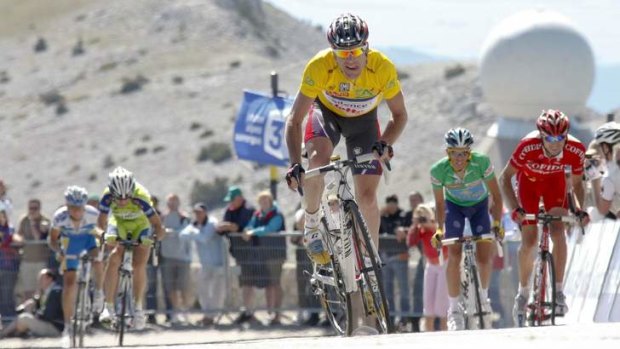 Cadel Evans, in yellow, on Mont Ventoux during the Dauphine Libere in 2009.