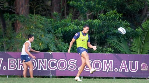 Preparing for the punt ... departing Broncos star Israel Folau seemed to be getting in some early goal-kicking practice at a recent Brisbane training session before the announcement of his move to AFL next year.