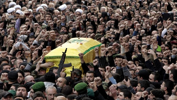 Hezbollah fighters in Beirut carry the coffin of Jihad Mughniyeh, the son of Imad Mughniyeh, a top Hezbollah operative assassinated in 2008 in Damascus and one of the six Hezbollah fighters killed in an Israeli airstrike.