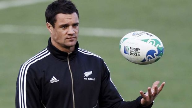 Unlikely starter: Dan Carter's hand is still swollen after fracturing a bone against the Waratahs on Friday night.