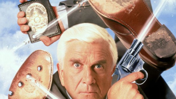 Neilsen as hapless detective Frank Drebin in The Naked Gun series.