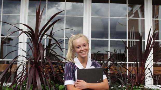 Globetrotting . . . Katie Parris-Veale of Barker College was among the 15,000 students who sat the last HSC exam papers in visual arts and science yesterday.