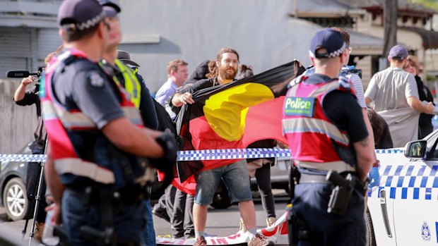 Police attend to Bendigo St protests.