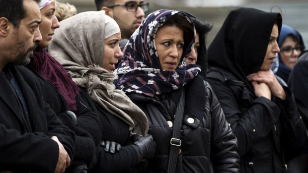 Mourners at the funeral of murdered police officer Ahmed Merabet at a Muslim cemetery in Bobigny, France.  