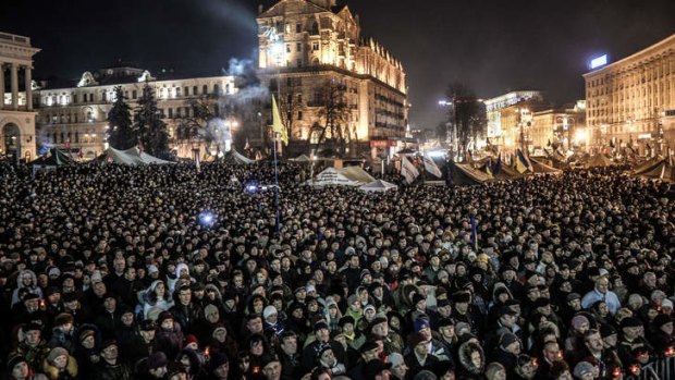 Thousands gather in Kiev's Independence Square to hear the line-up of the new cabinet.