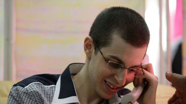 Phone home ... Gilad Shalit speaks to his family.