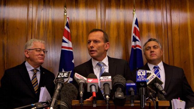 Opposition leader Tony Abbot, shadow treasurer Joe Hockey (right) and shadow minister for finance and deregulation Andrew Robb (left).