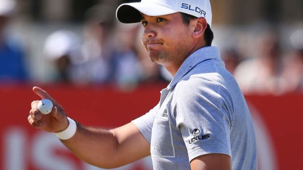 Sand and deliver: Jason Day.