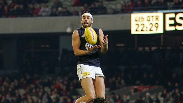 The AFL's most improved player? Andrew Walker with his mark-of-the-year candidate against Essendon.