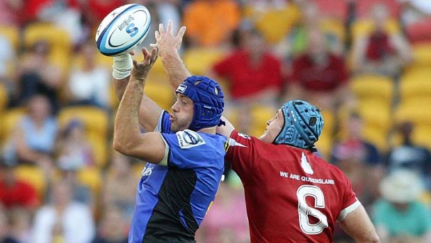 Nathan Sharpe of the Force and James Horwill of the Reds compete for the ball during their round one Super Rugby match.