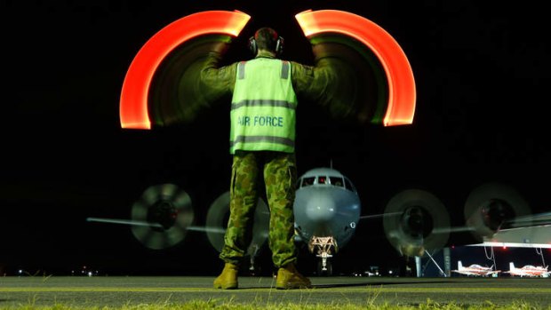 Rough ride: An Orion returns to RAAF base Pearce from its search over the southern Indian Ocean.
