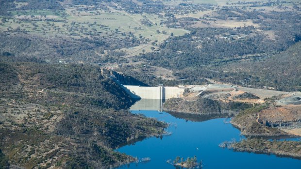 Canberra's water and sewerage charges will be reviewed under the direction of senior public servant Peter Grant.