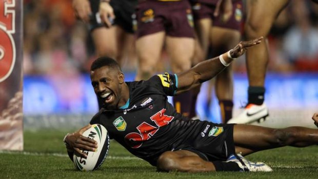 Magic man: James Segeyaro scores one of three tries for the Panthers.