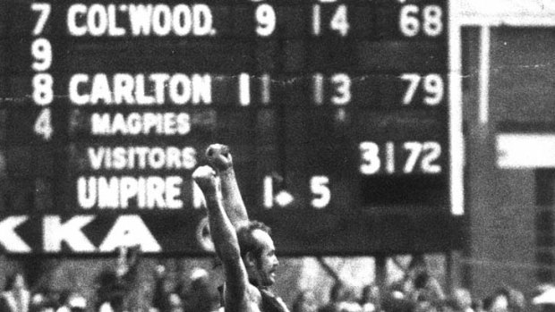 Carlton's Alex Jesaulenko jumps up with hands in the air