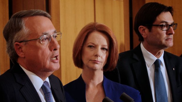 Julia Gillard, Wayne Swan and  Greg Combet unveil details of the carbon tax
