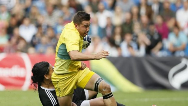 Not this time: Greg Jeloudev scored Australia's opening try in the bronze medal match but he was unable to get past New Zealand's Ben Lam in the semi-final.