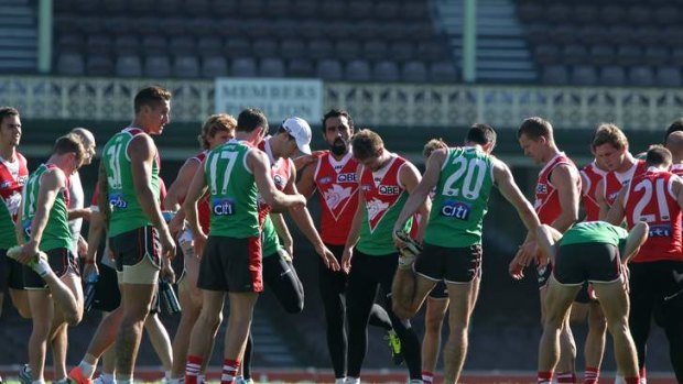 Back to work: Adam Goodes got his mind back on football on Thursday, training with his teammates at the SCG.