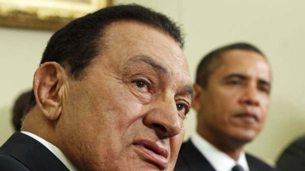 'Clinically dead' ... Hosni Mubarak (left) pictured with US President Barack Obama.