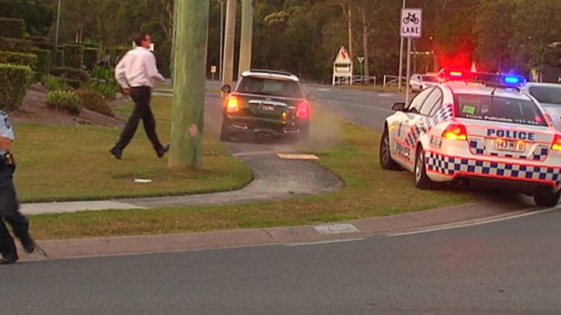 The car is driven away from police on the Gold Coast.