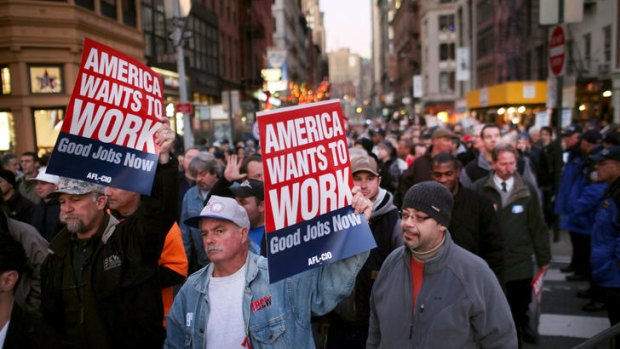 Members of unions and Occupy Wall Street protesters take part in the "March For Jobs and Fairness" in New York.
