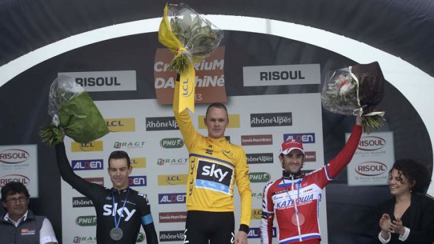 Perfect warm-up: Britain's Christopher Froome celebrates his overall victory ahead of Australia's Richie Porte left, and Spain's Daniel Moreno Fernandez.