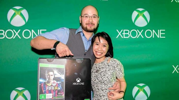 The first people in Australia to collect their Xbox One were Francis King and Angela Tran.