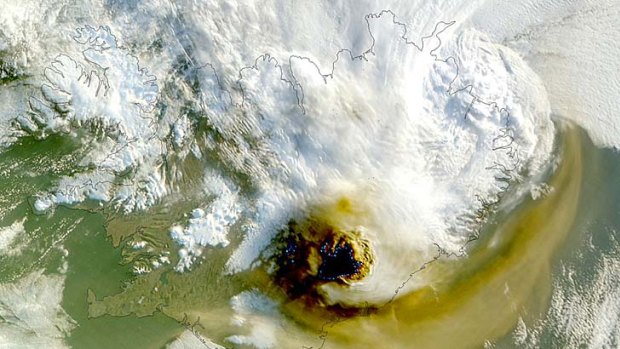 An image released by the NASA shows smoke billowing from the Grimsvoetn, Iceland's most active volcano.