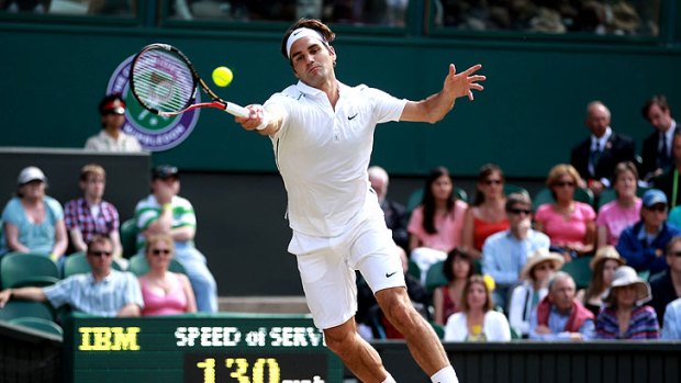Roger Federer reaches for a shot during his quarter-final clash with Jo-Wilfried Tsonga.