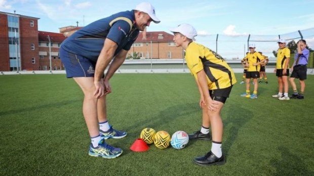 Enthusiastic: Former Wallabies skipper James Horwill at a surprise training session at St Laurence College in Brisbane.