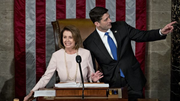 US House Speaker Republican Paul Ryan, right, and House Minority Leader Democrat Nancy Pelosi after being reelected in the House Chamber on Tuesday.