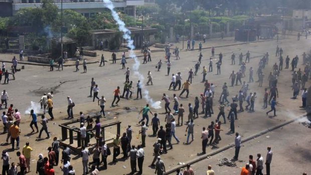 Supporters of Egypt's ousted President Mohammed Morsi clash with security forces.