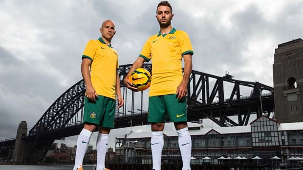 Mark Bresciano and Michael Zullo model the Socceroos' new kit.
