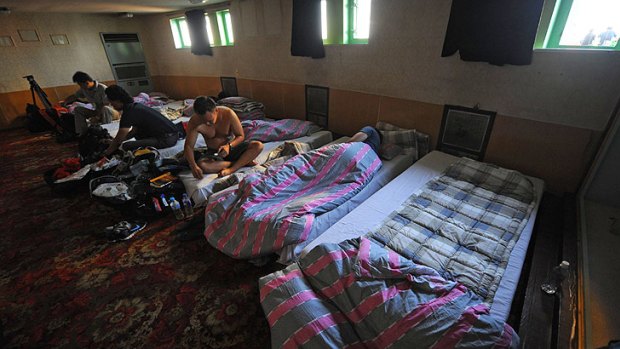 A sleeping cabin for foreign journalists onboard the cruise ship Mangyongbong in the first-ever cruise from Rason in North Korea, which  has only been open to Western tourists since 1987 and remains tightly controlled.