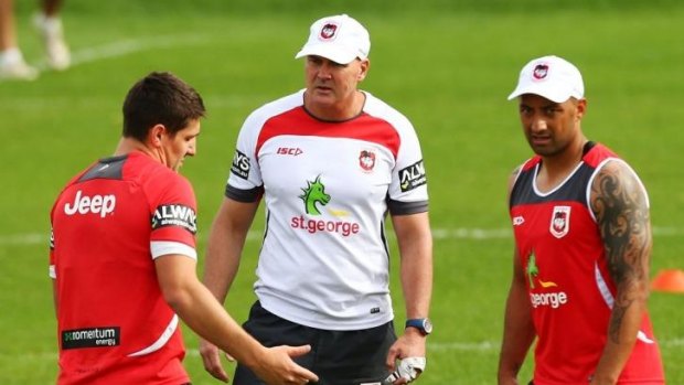 Settling in: New Dragons coach Paul McGregor talks with Gareth Widdop and Benji Marshall during training this week.