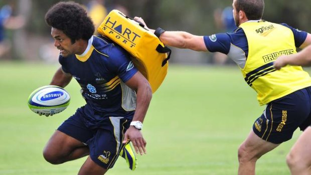 ACT Brumbies player Henry Speight, left, during training at the AIS on Monday.