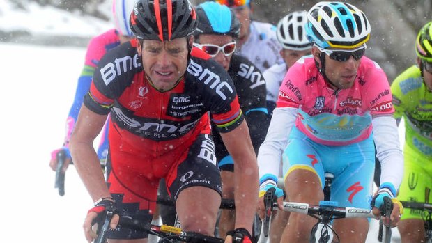 Hard work ahead: Cadel Evans and race leader Vincenzo Nibali battle it out during the Giro. Photo: AP