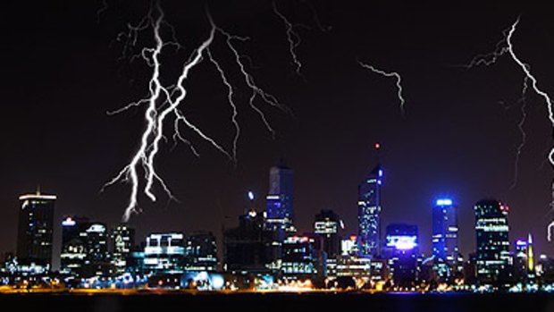 Lightning crashes over the Perth city skyline as the storm rages through.