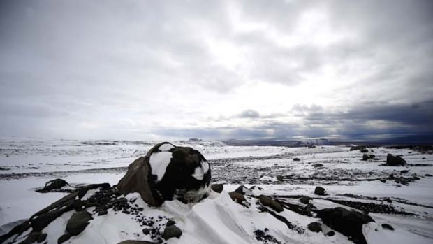Volcanic boulders sit atop the Myrdalsjokull glacier, which is part of the ice cap sealing the Katla volcano, near the Icelandic village of Vik.