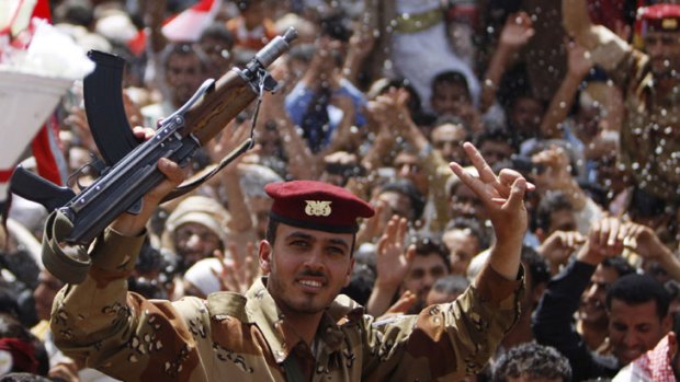 Another president goes ... crowds celebrate in Yemen.