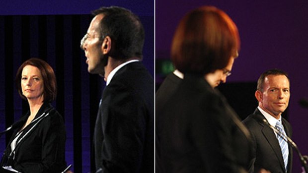 Moments from a debate: Julia Gillard and Tony Abbott last night.
