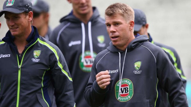 Late withdrawal: David Warner  warms up for the match against New Zealand.