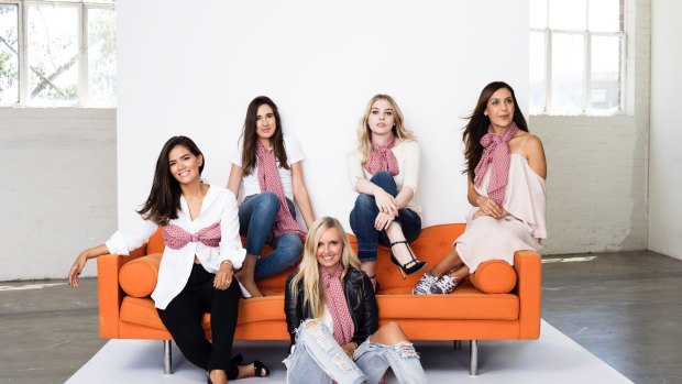 Canberra Fashion blogger Janette Lenk (seated far left) was selected to be one the faces to launch a UN Women National Committee (NC) Australia purple scarf to mark International Women's Day.