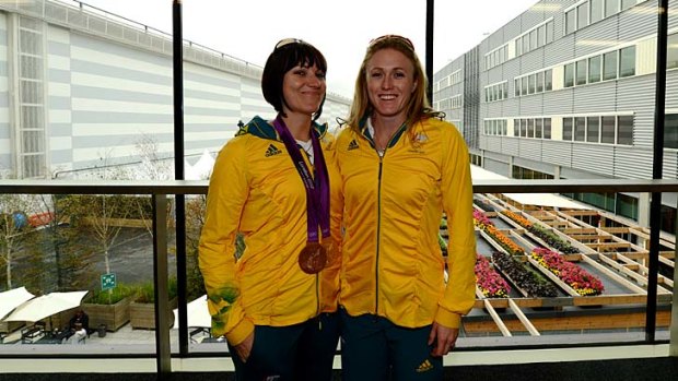 Twin triumphs ... Australia's gold medallists, Sally Pearson and Anna Meares, celebrate their success together. Photo: Pat Scala